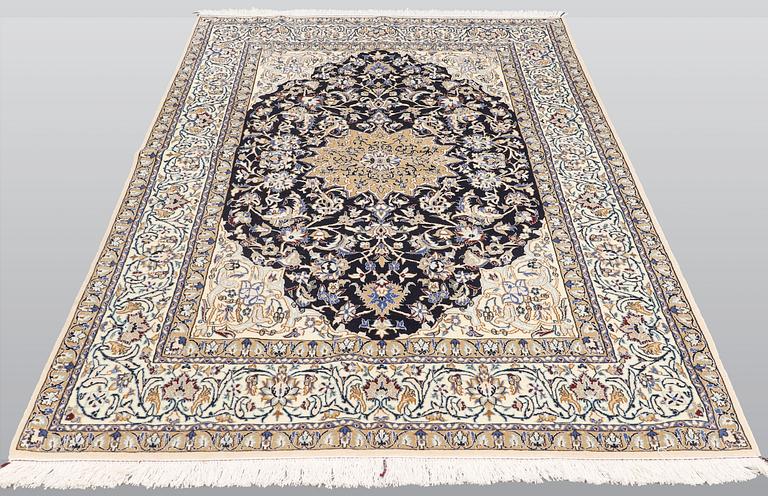 A carpet, Nain Part Silk, sk 9 LAA, ca 244 x 155 cm.
