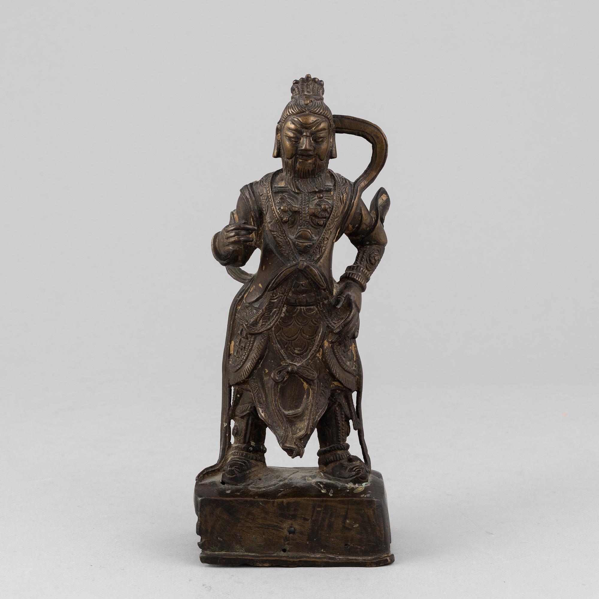 A bronze sculpture of a warrior, Qing dynasty.