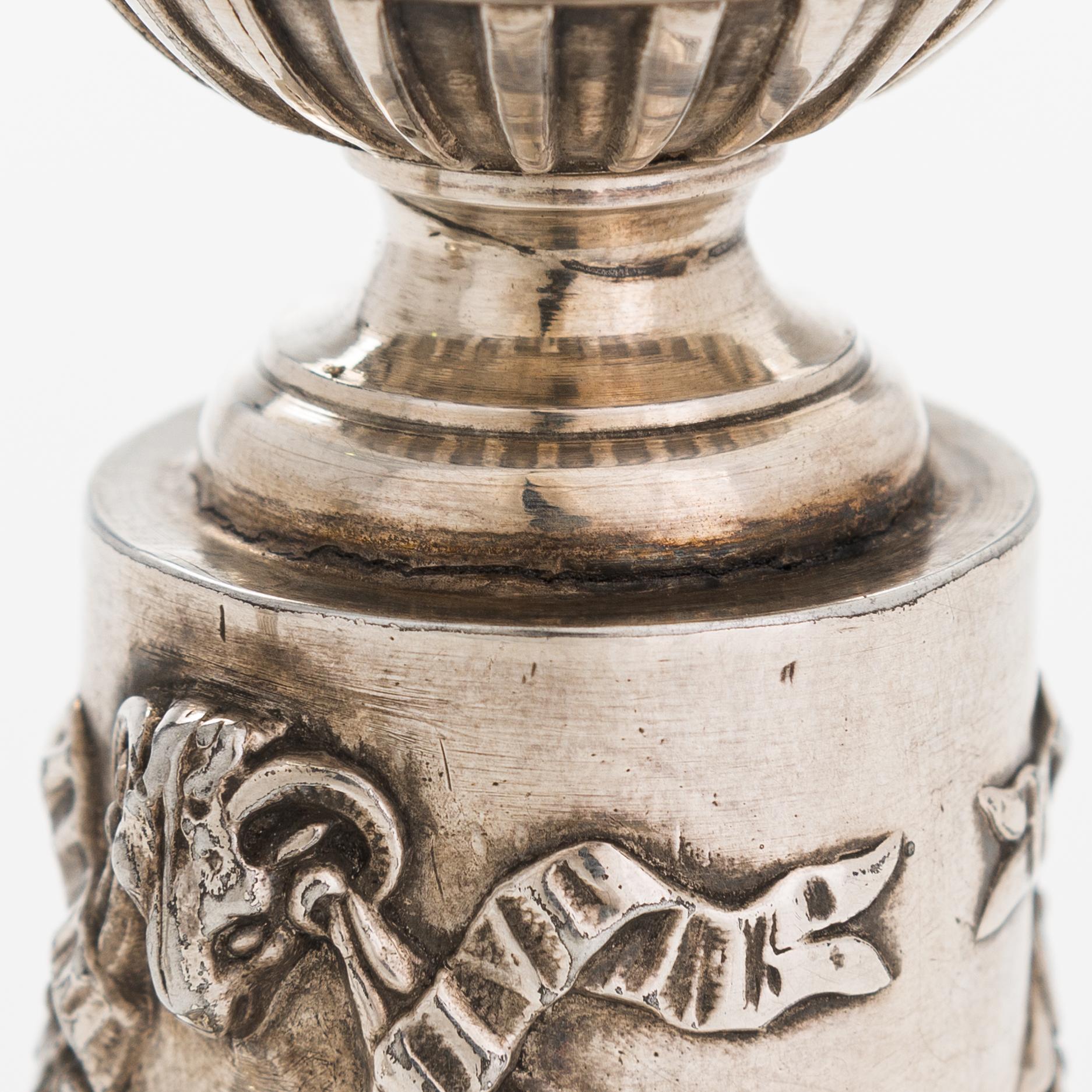A pair of Saglier Frères silver plated Louis XVI-style candlesticks from around year 1900.