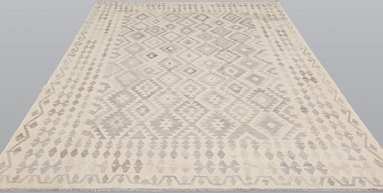 A kilim carpet, c 293 x 203.