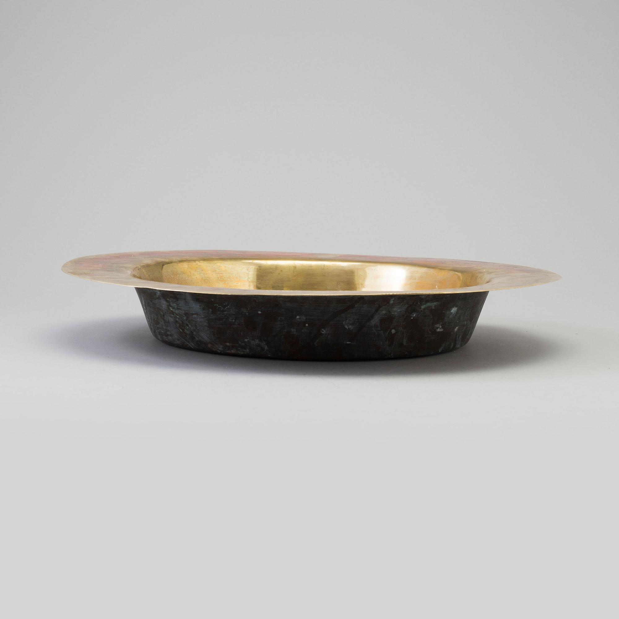 A brass dish, 16th century, Nürnberg.