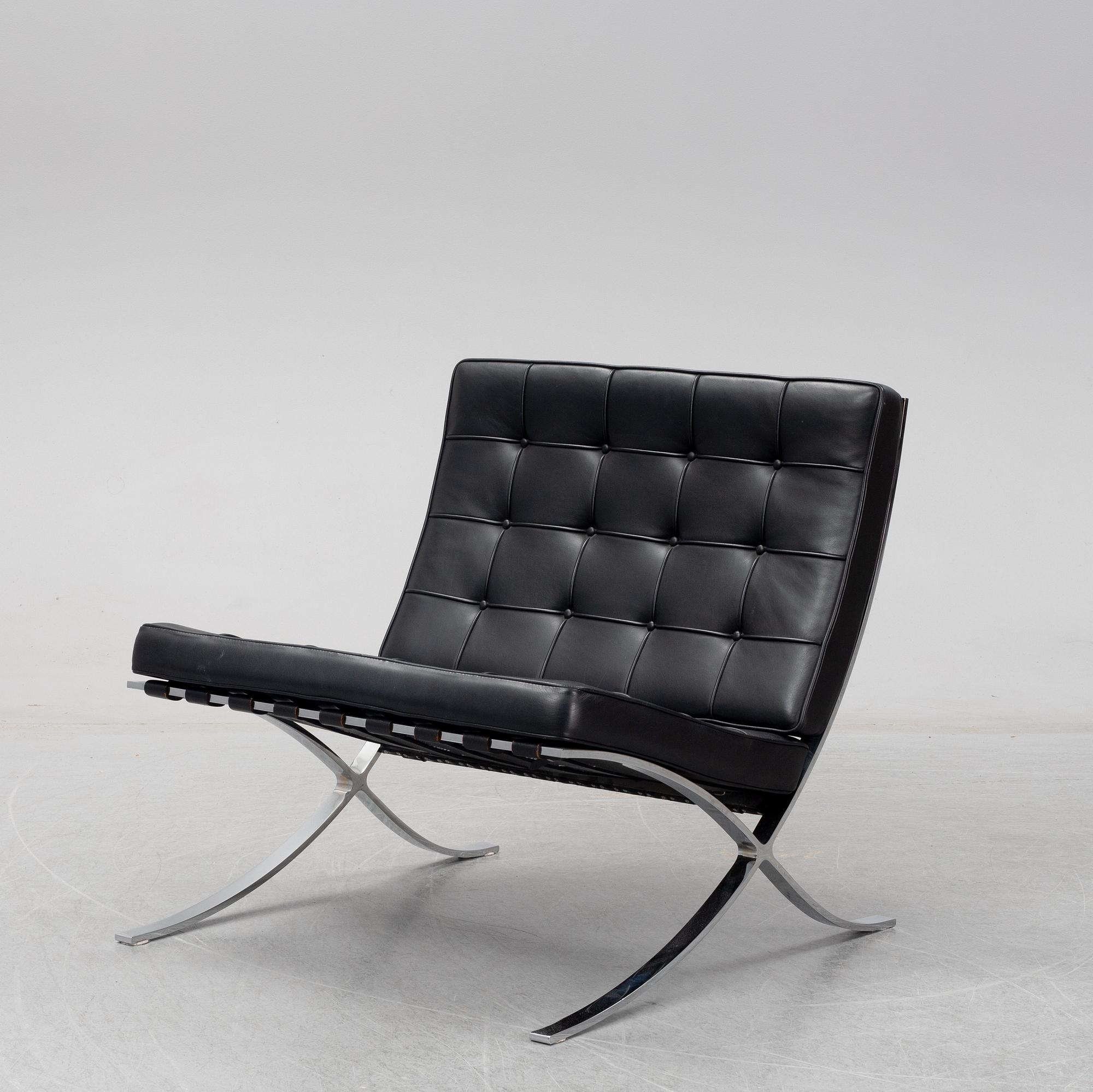 LUDWIG MIES VAN DER ROHE, a 'Barcelona' black leather lounge chair, Knoll Studio.