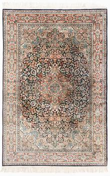 An oriental carpet, mercerized cotton, c. 275 x 182 cm.