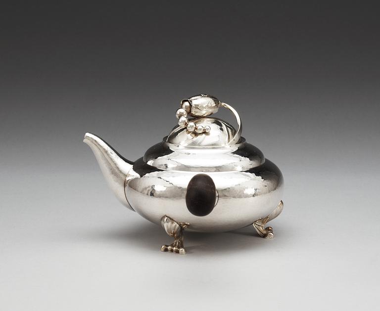 A Georg Jensen sterling 'Blossom' tea-pot, design nr 2D by Georg Jensen, Copenhagen 1996.