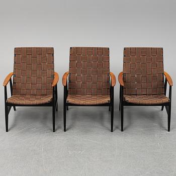A set of three 1950's easy chairs.