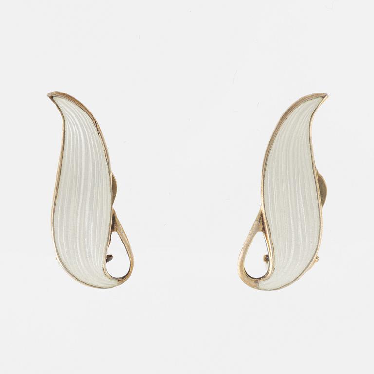 Brooch and a pair of earrings, sterling silver and white enamel. Norway.