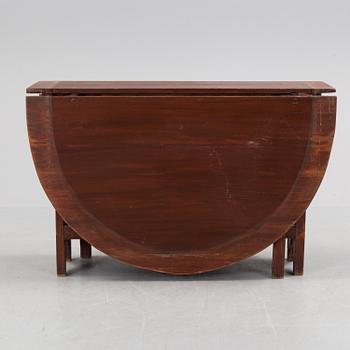 A 19th century painted flap table.