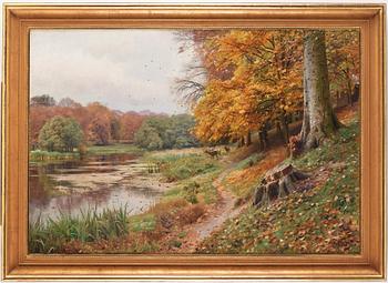 Peder Mork Mönsted, Autumn day in the forest, red deer by a lake.