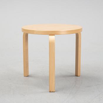 A bench and a stool by Alvar Aalto, from around the year 2000.