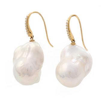 A pair of earrings with cultured baroque-shaped freshwater pearls and round brilliant-cut diamonds.