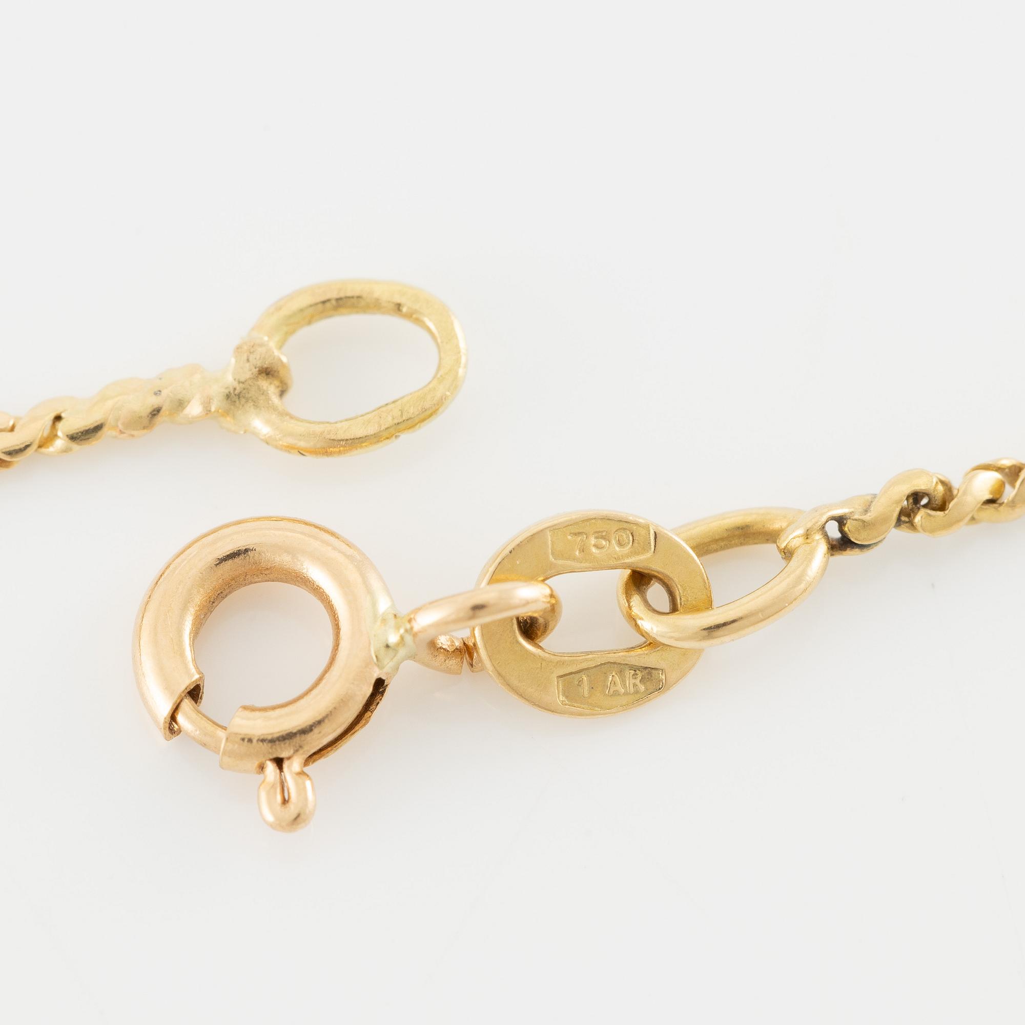 Pendant in 18K gold with a round brilliant-cut diamond.