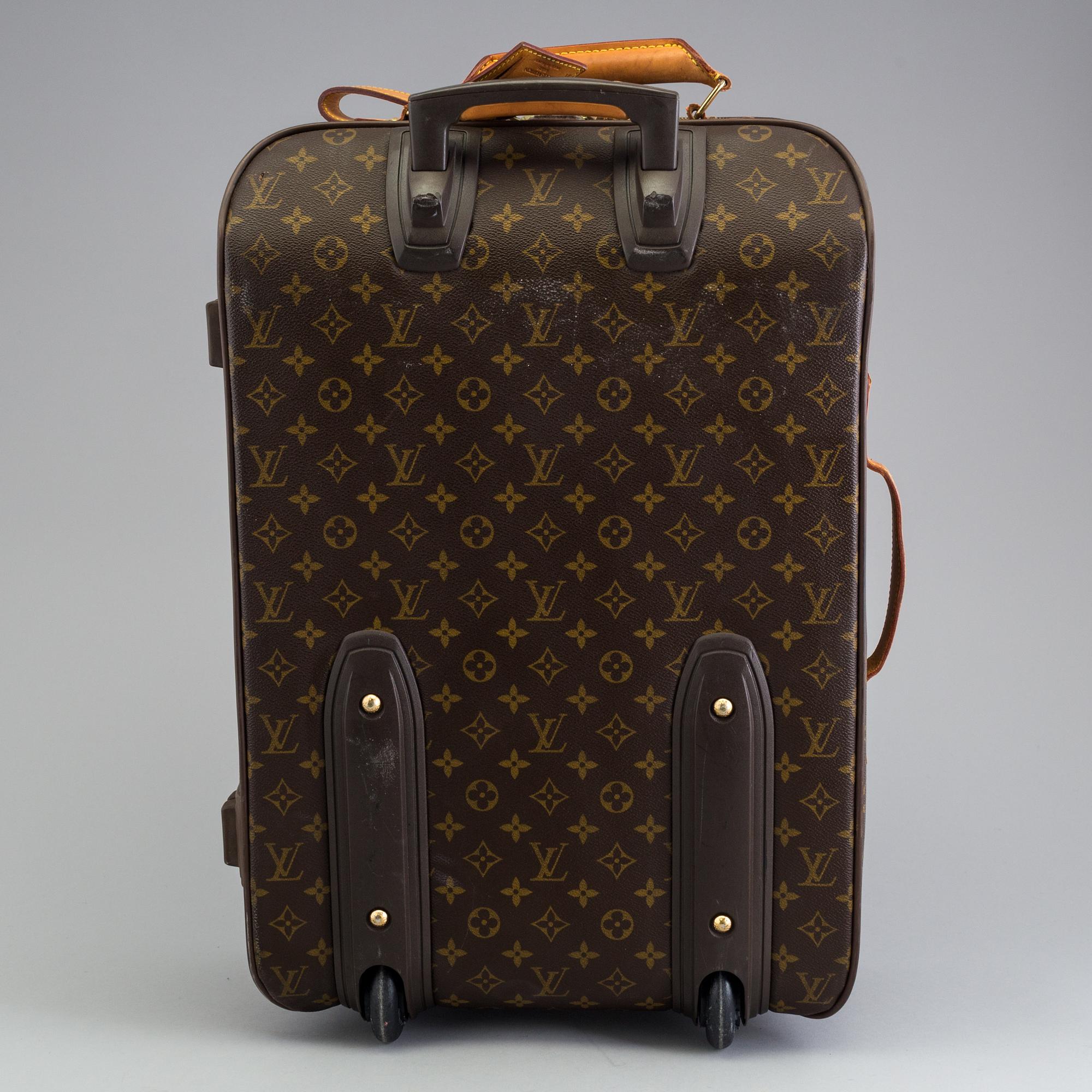 LOUIS VUITTON,  "Pégase 55", carry on suitcase on wheels.