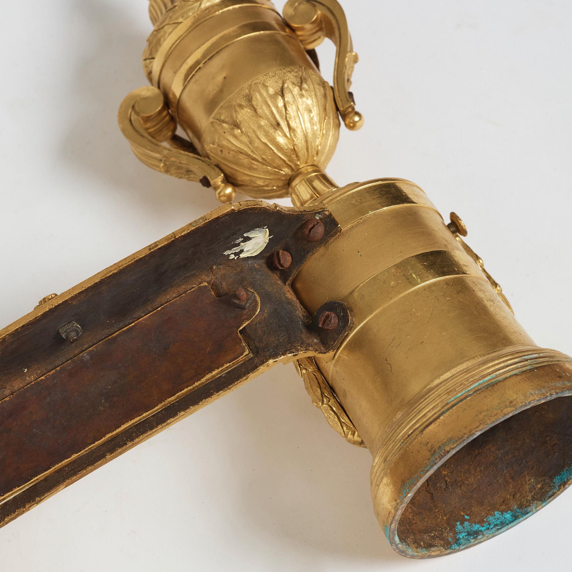 A pair of Louis XVI 18th Century bronze chenets.