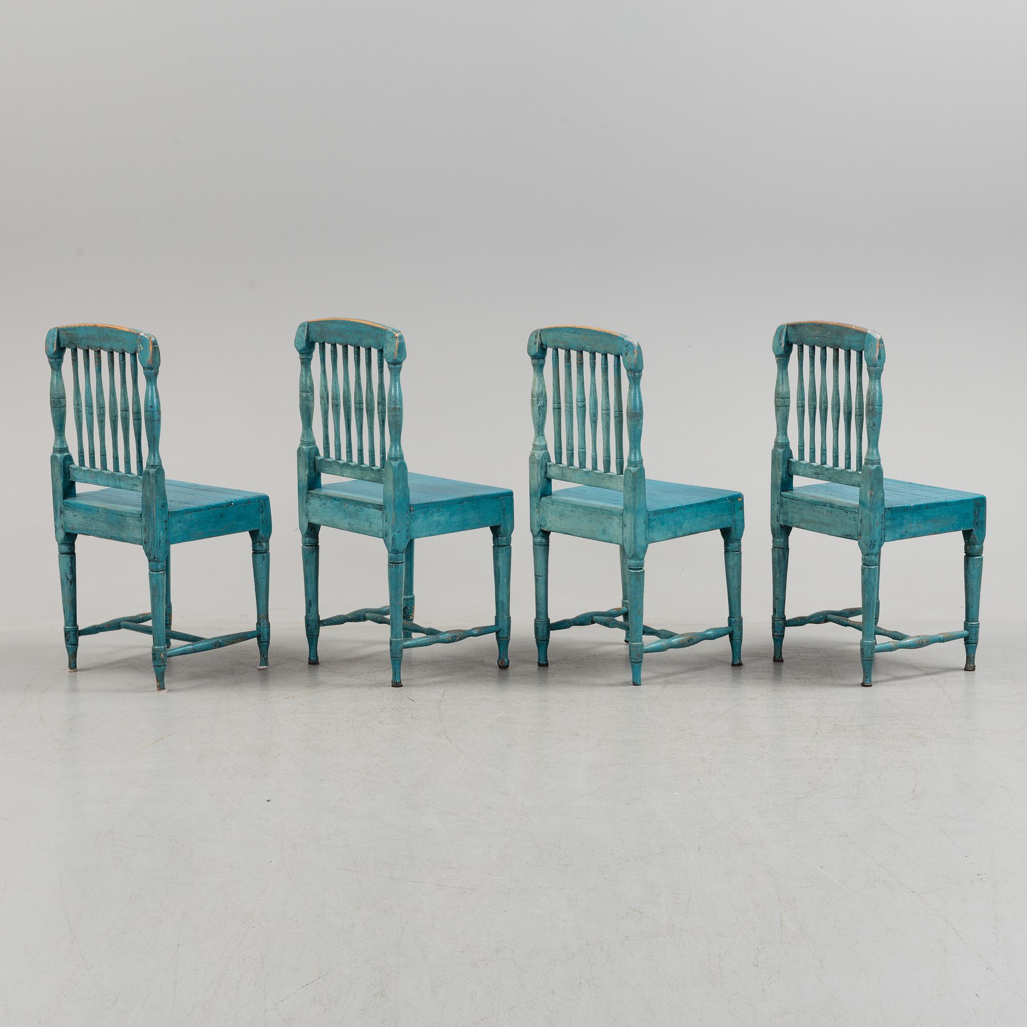 A set of four 19th century folk art chairs.