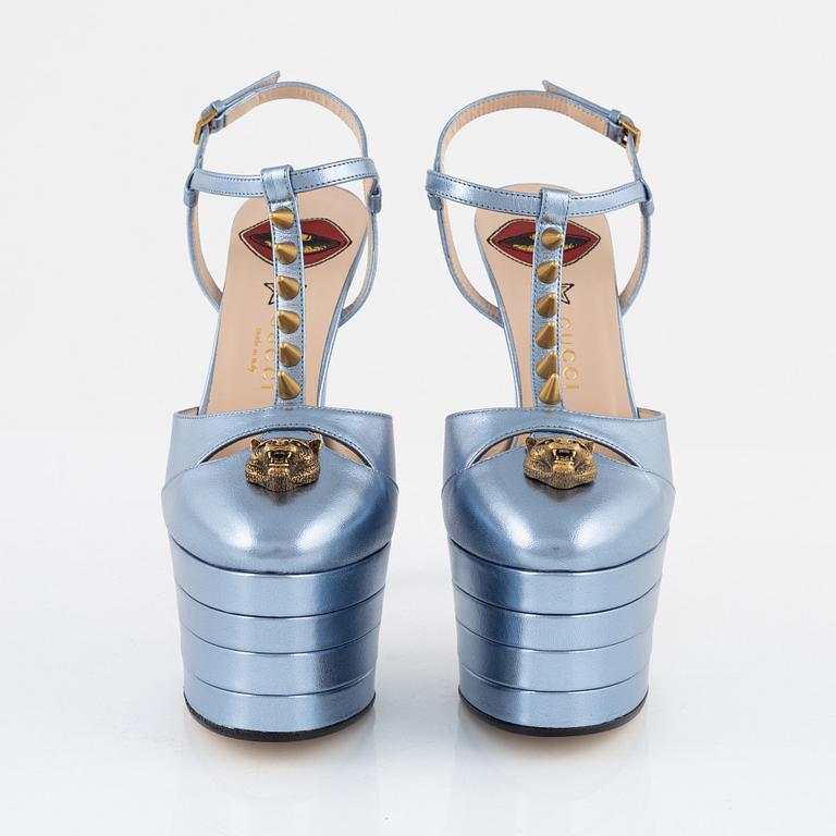Gucci, a pair of baby blue metalic leather high heel shoes, 2016, size 37.