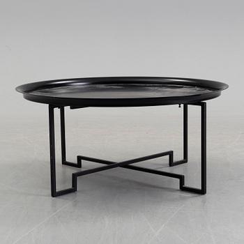 A coffee table designed in 2000 by Per Öberg for Svensk Tenn.