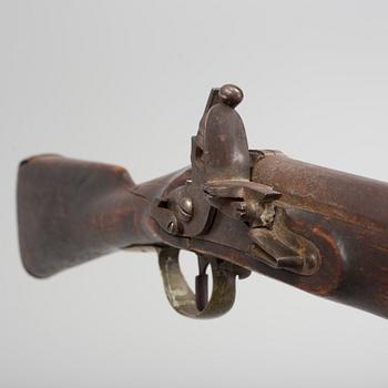 An early 19th century flintlock rifle.