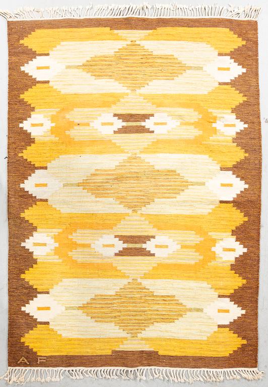 A Swedish signed flat weave carpet ca 225x165 cm.