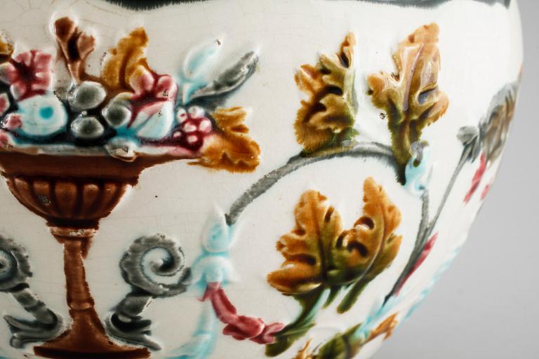 A majolica vase and two majolica flower pots from Rörstrand, around the year 1900.