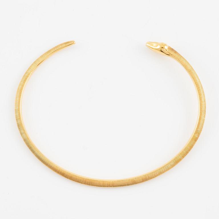 An Ole Lynggaard bracelet 18K gold in the shape of a snake.