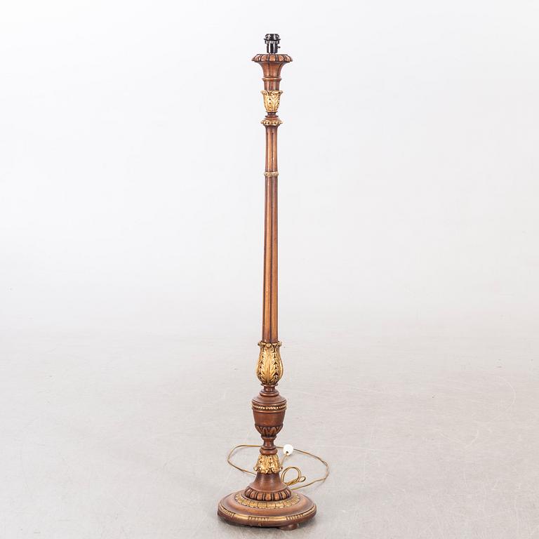 An mid 20th century wood floorlamp from Paoletti, Firenze Italy.