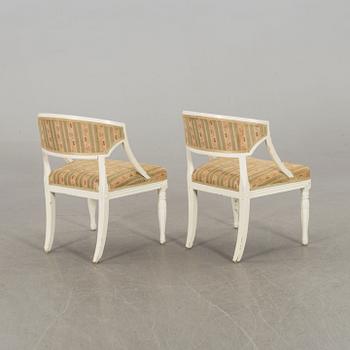 a pair of 19th century armchairs.