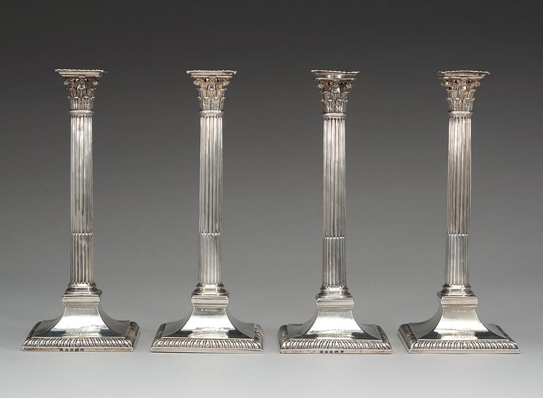 Two similar pairs of English candlesticks, marks of John Wakelin and William Taylor, London 1786 and 1787.