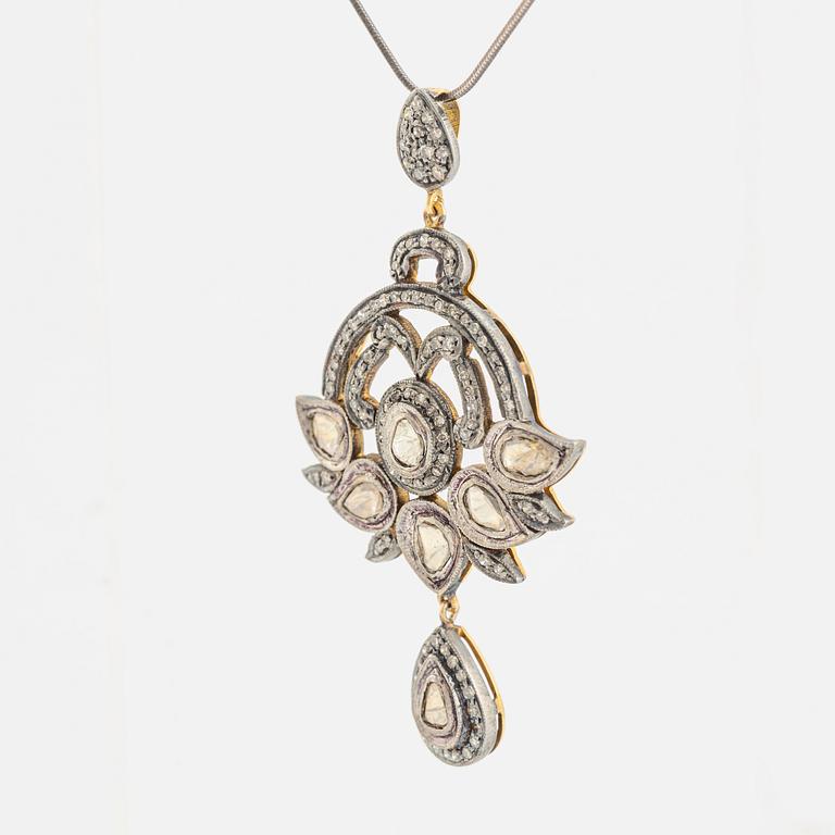 A faceted diamond necklace.