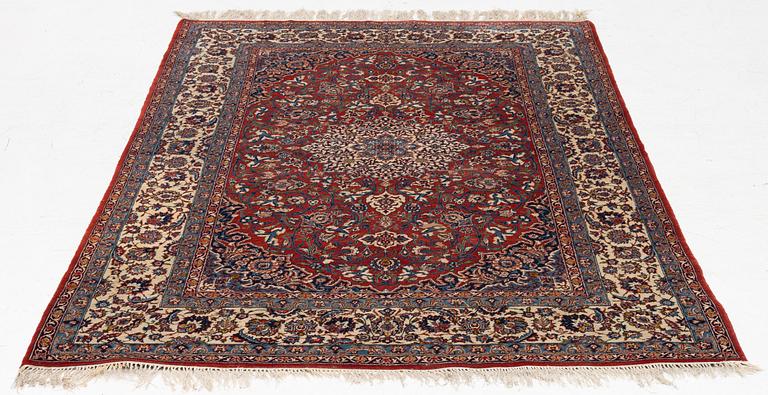An Isfahan rug, c. 225 x 150 cm.