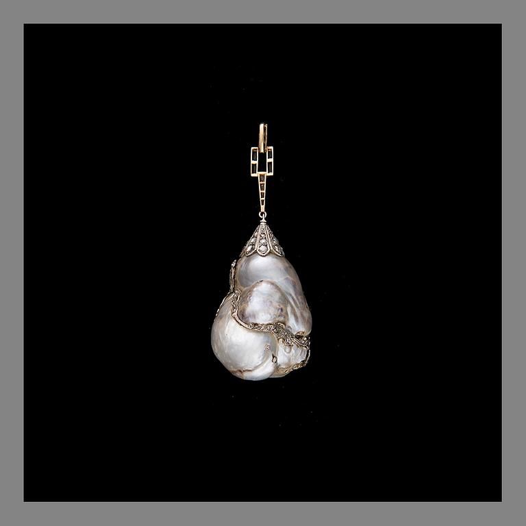 A PENDANT, baroque pearl, platinum and gold, rose cut diamonds, enamel. Weight c. 26.2 g.