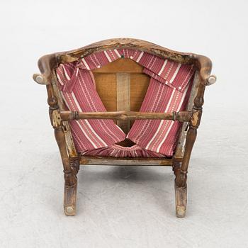 A Rococo armchair, mid 18th century.