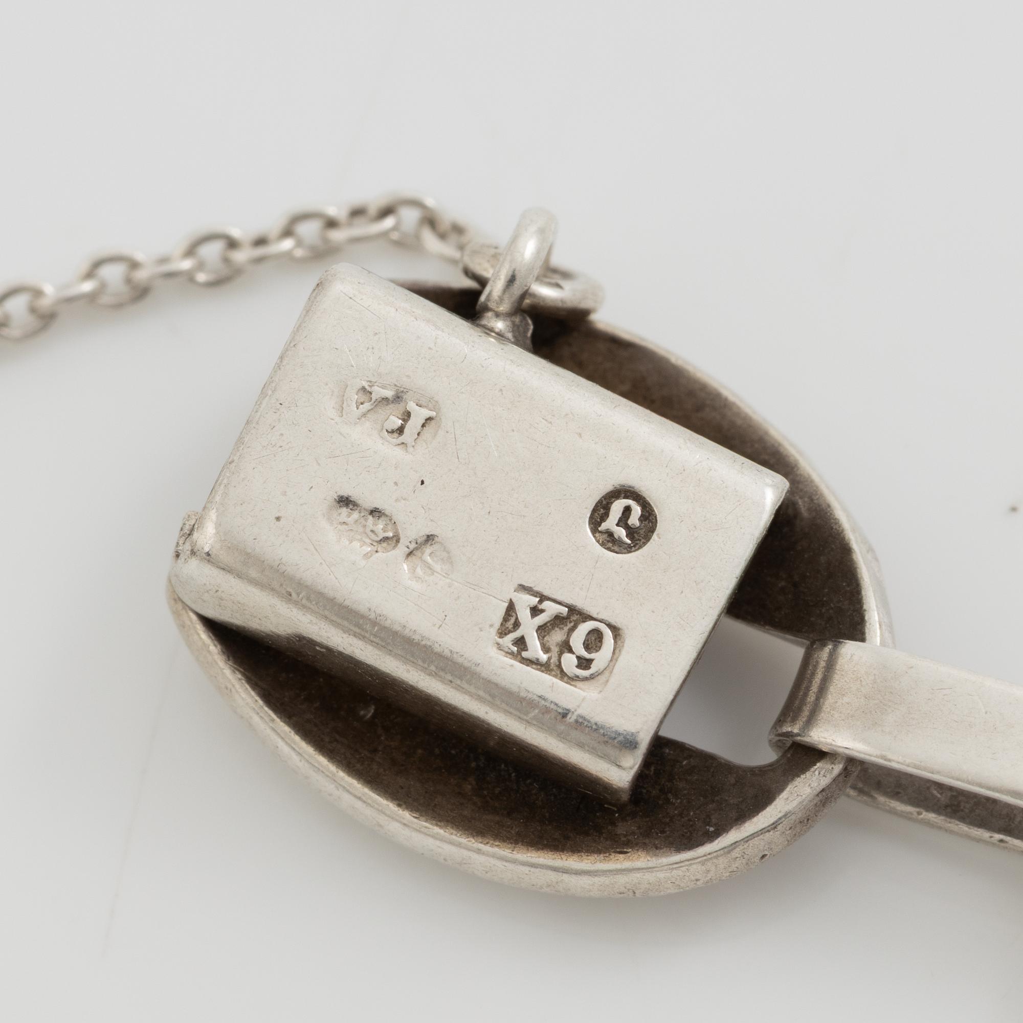 Victor Janson, two silver bracelets, one set with tiger's eye.
