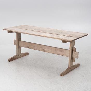 A wooden table, circa 1900.