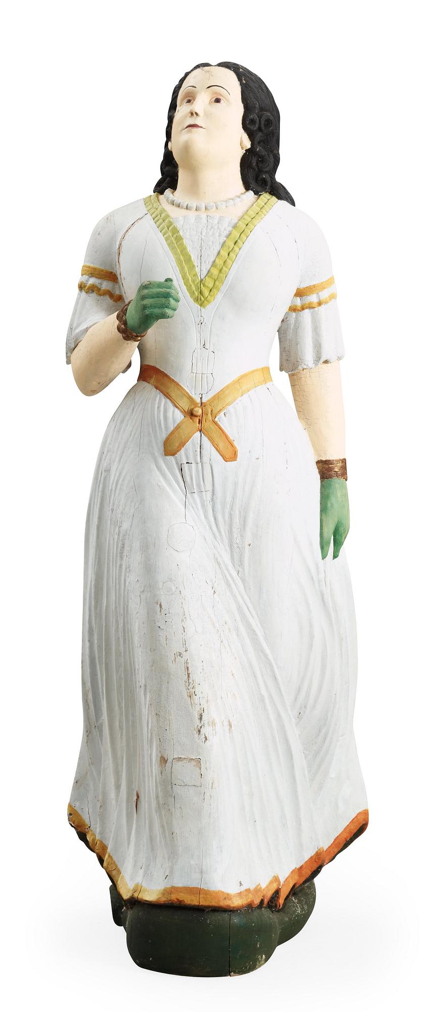 A 19th century wooden figure-head.