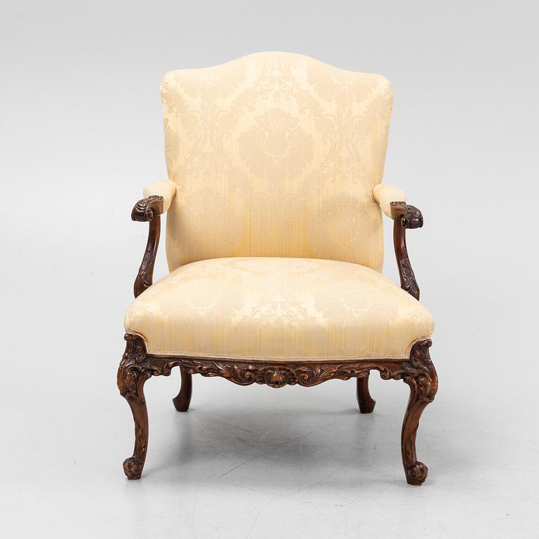 A carved mahogany George II armchair, 18th Century.
