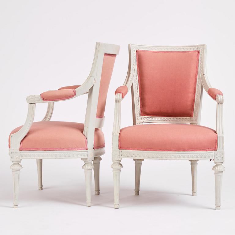 A pair of late Gustavian open armchairs by E. Ståhl (master in Stockholm 1794-1820).