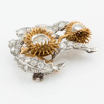 A platinum and 18K gold brooch with an old-cut diamond approximately 1.50 cts.