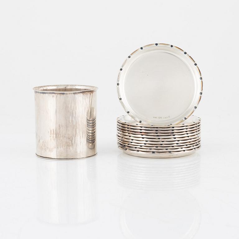 A Swedish Silver Beaker by Sigurd Persson, and twelve coasters by GAB, silver, 1940s-50s.