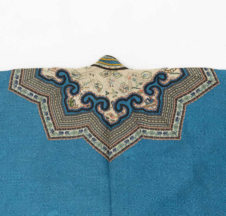 A Han Chinese woman's heather blue informal three quater length coat, 'Ao', Qing dynasty, 19th century.