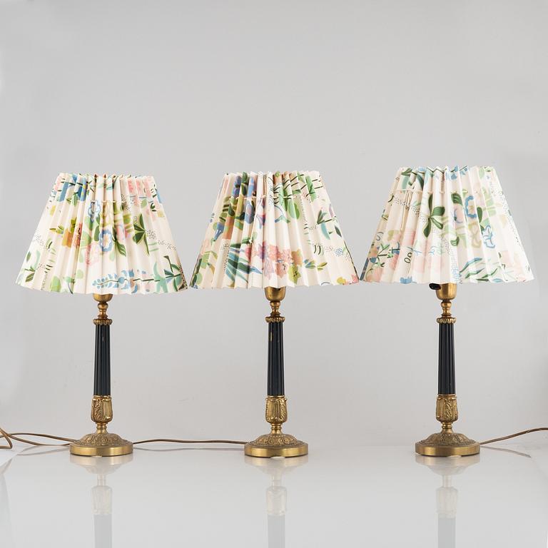 Three table lamps, Empire style, circa mid-20th Century.