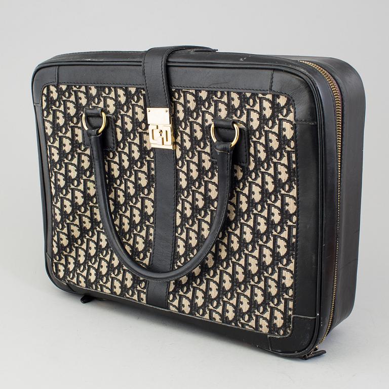 CHRISTIAN DIOR, a monogram canvas suitcase.