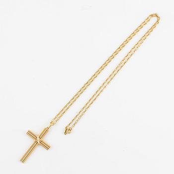 A Cartier necklace 18K multi-coloured gold "Trinity" cross.