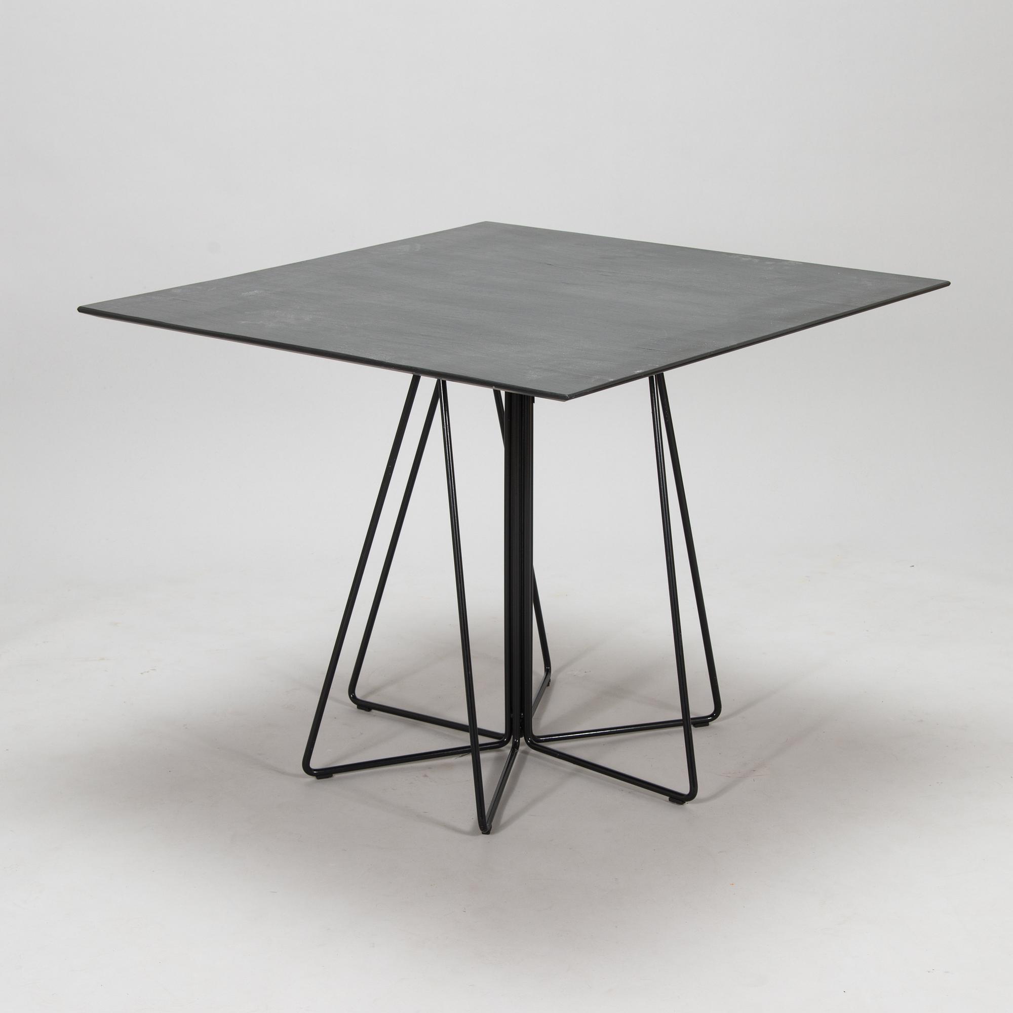 Lella and Massimo Vignelli, A "Paperclip" table in slate from Knoll 1994.