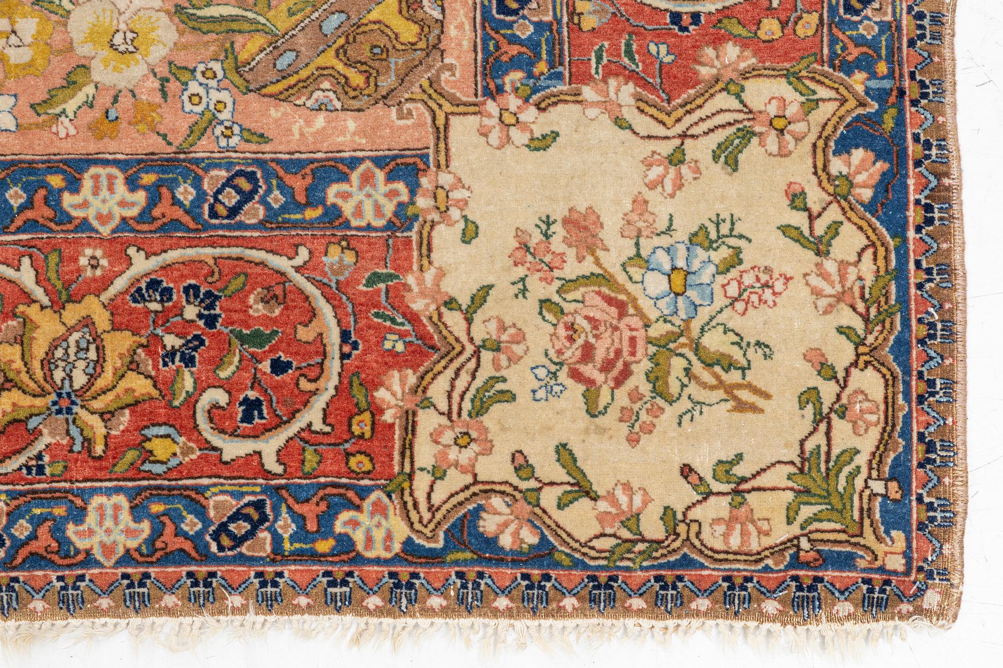 A semi-antique Tabriz carpet, West Persian, c. 250 x 175 cm.