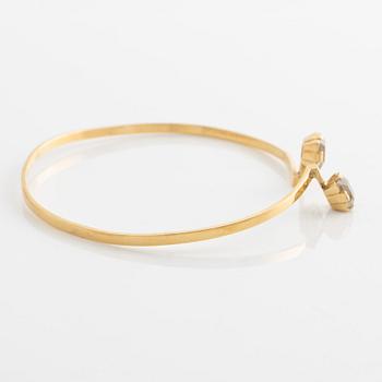 Stigbert, armring, 18K guld med bergkristall.