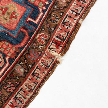 A antique Heriz carpet, ca 384 x 275 - 290 cm.