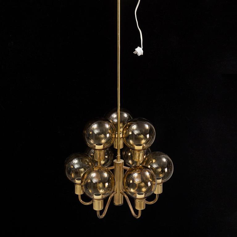 Hans-Agne Jakobsson, a late 20th century brass and glass ceiling lamp for nine lights, Markaryd, Sweden.