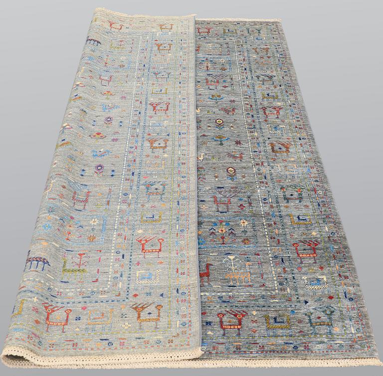 A carpet, oriental, ca 244 x 170 cm.