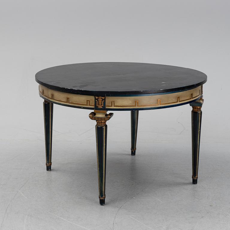 A painted, round art deco dining table from the 1920s.