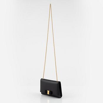 Salvatore Ferragamo, a black saffiano leather crossbody bag.